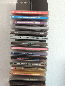 Diverse CD's und CD- Ständer. Diverse CD's und CD- Ständer gemäss Fotos zu verschenken