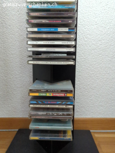 Diverse CD's und CD- Ständer. Diverse CD's und CD- Ständer gemäss Fotos zu verschenken
