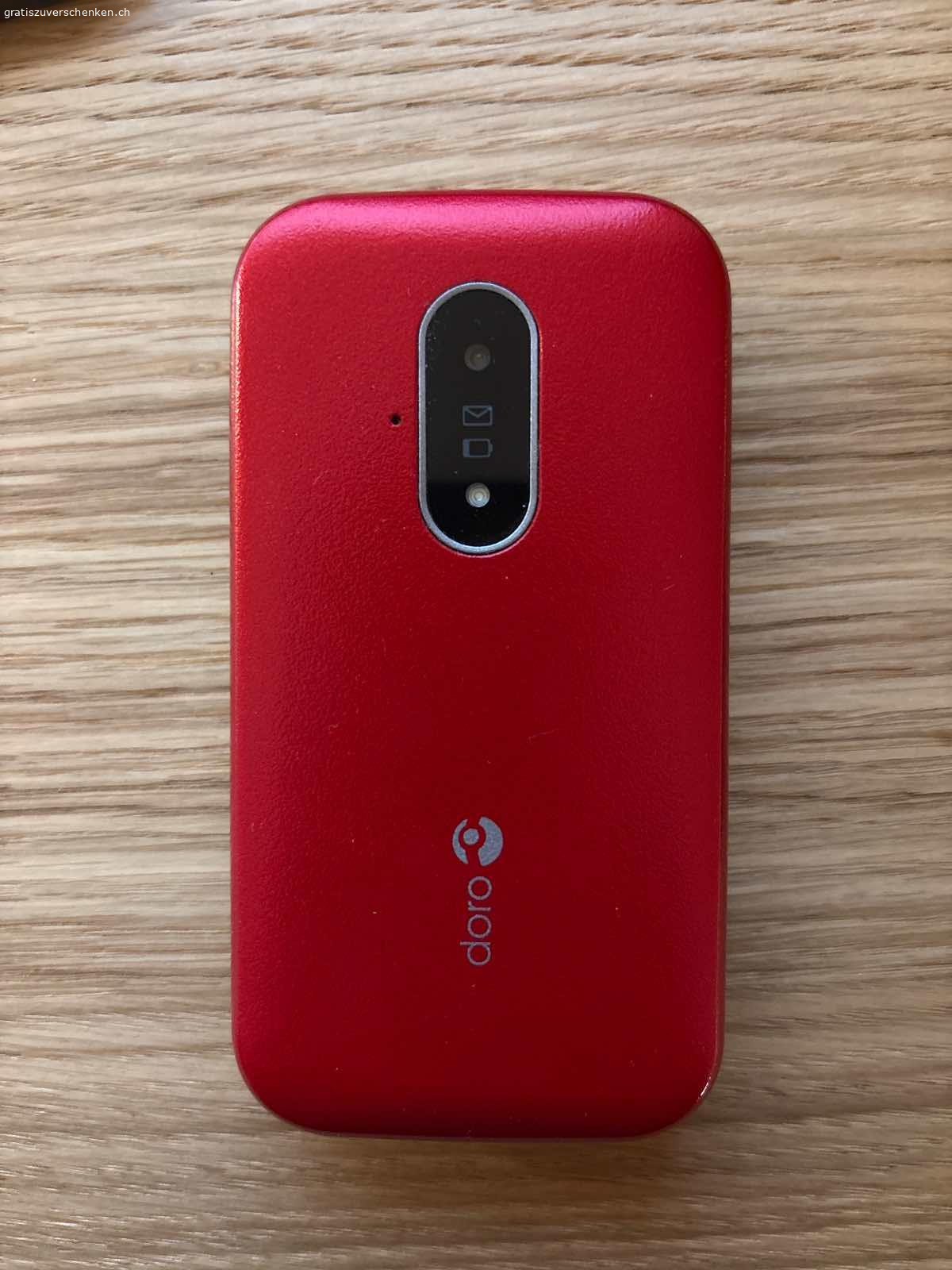 DORO  HANDY. Doro Handy, Modell 6820, Farbe rot, fast nie gebraucht, unlock und unter Garantie bis 01.2028 zu verschenken. Hilfetaste auf der Rückseite