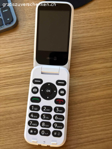 DORO  HANDY. Doro Handy, Modell 6820, Farbe rot, fast nie gebraucht, unlock und unter Garantie bis 01.2028 zu verschenken. Hilfetaste auf der Rückseite