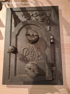 Schwedische Schmiedekunst (Kerzenhalter und Ofentür)